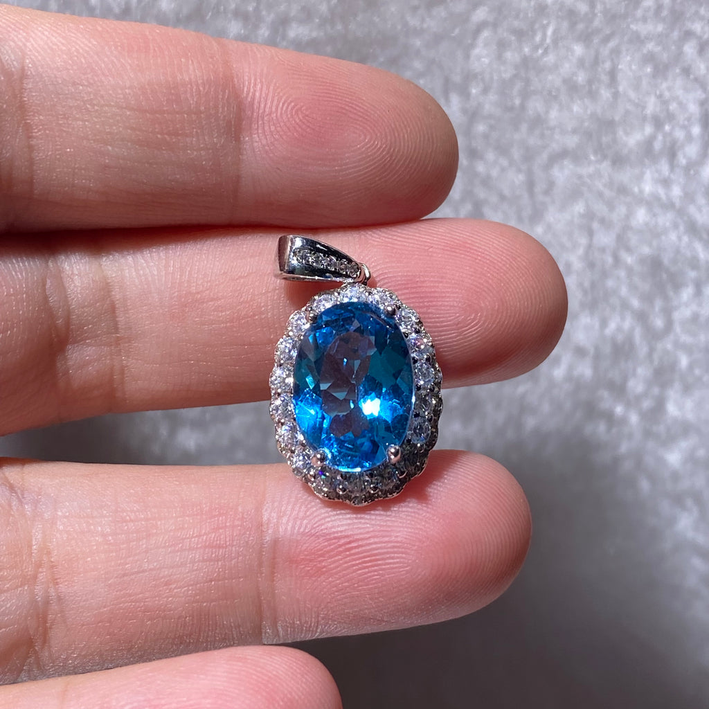 Swiss Blue Topaz Oval Halo Pendant