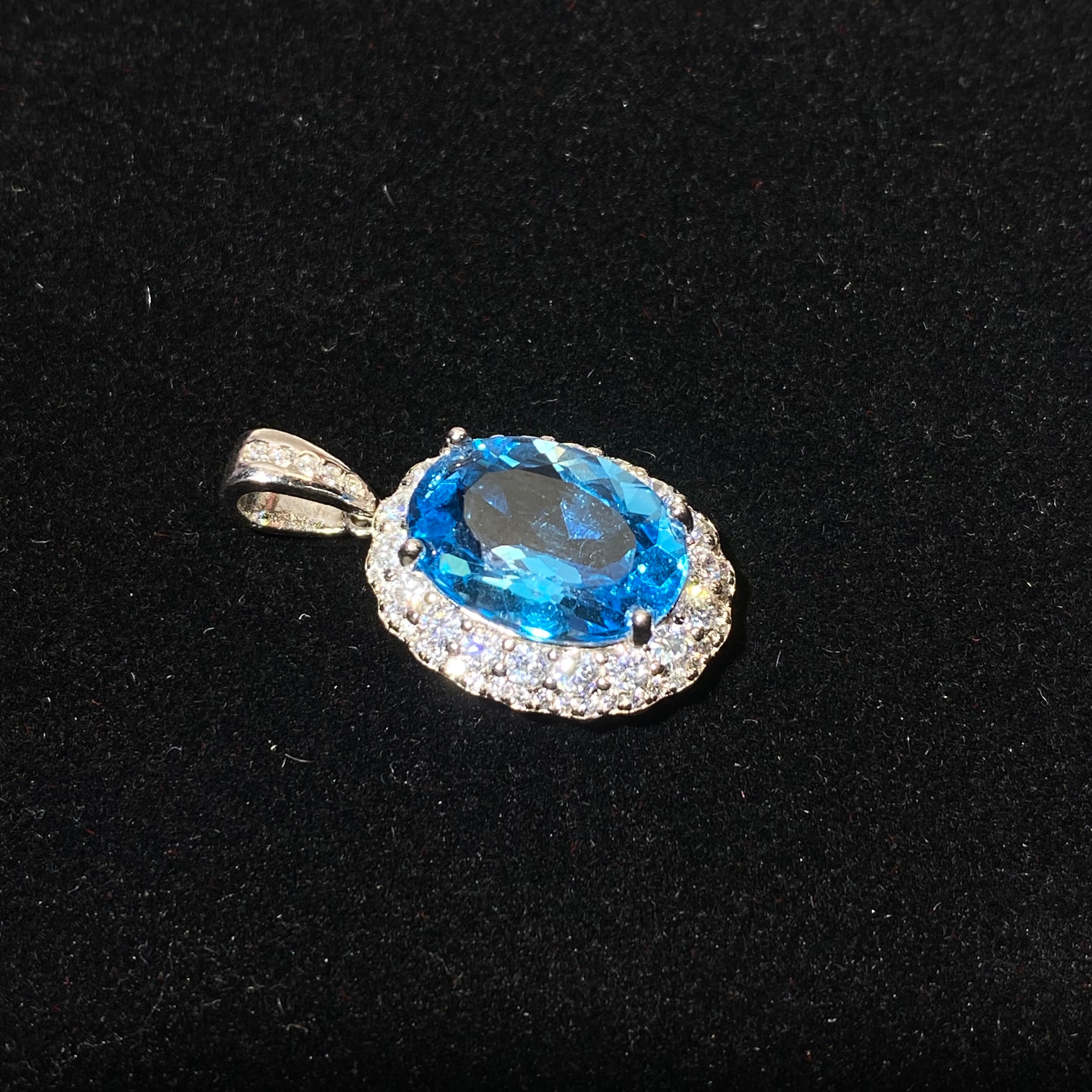 Swiss Blue Topaz Oval Halo Pendant