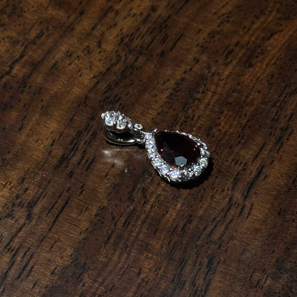 Natural Garnet Teardrop Halo Silver‑Tone Pendant