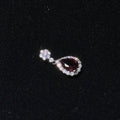 Natural Garnet Teardrop Halo Silver‑Tone Pendant