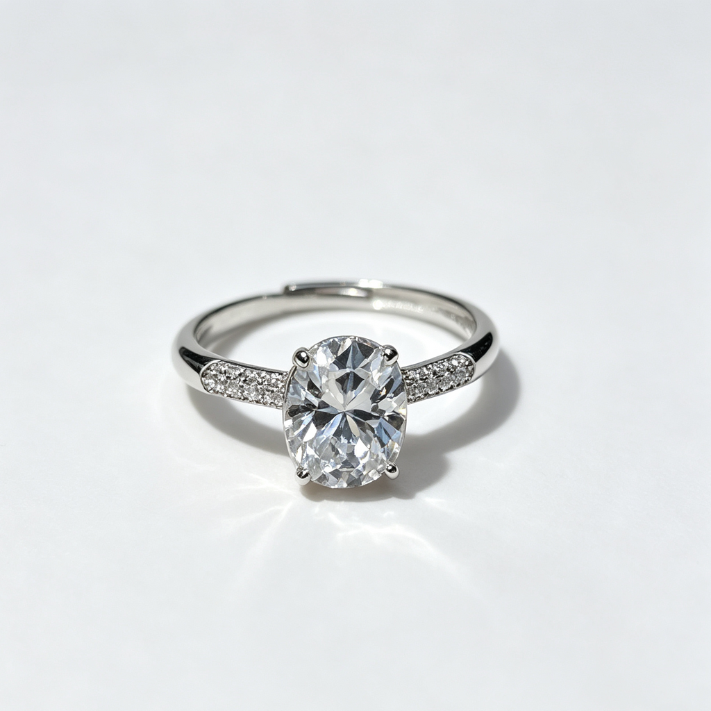 4-Prong Round Solitaire Ring with Paved Side Stones