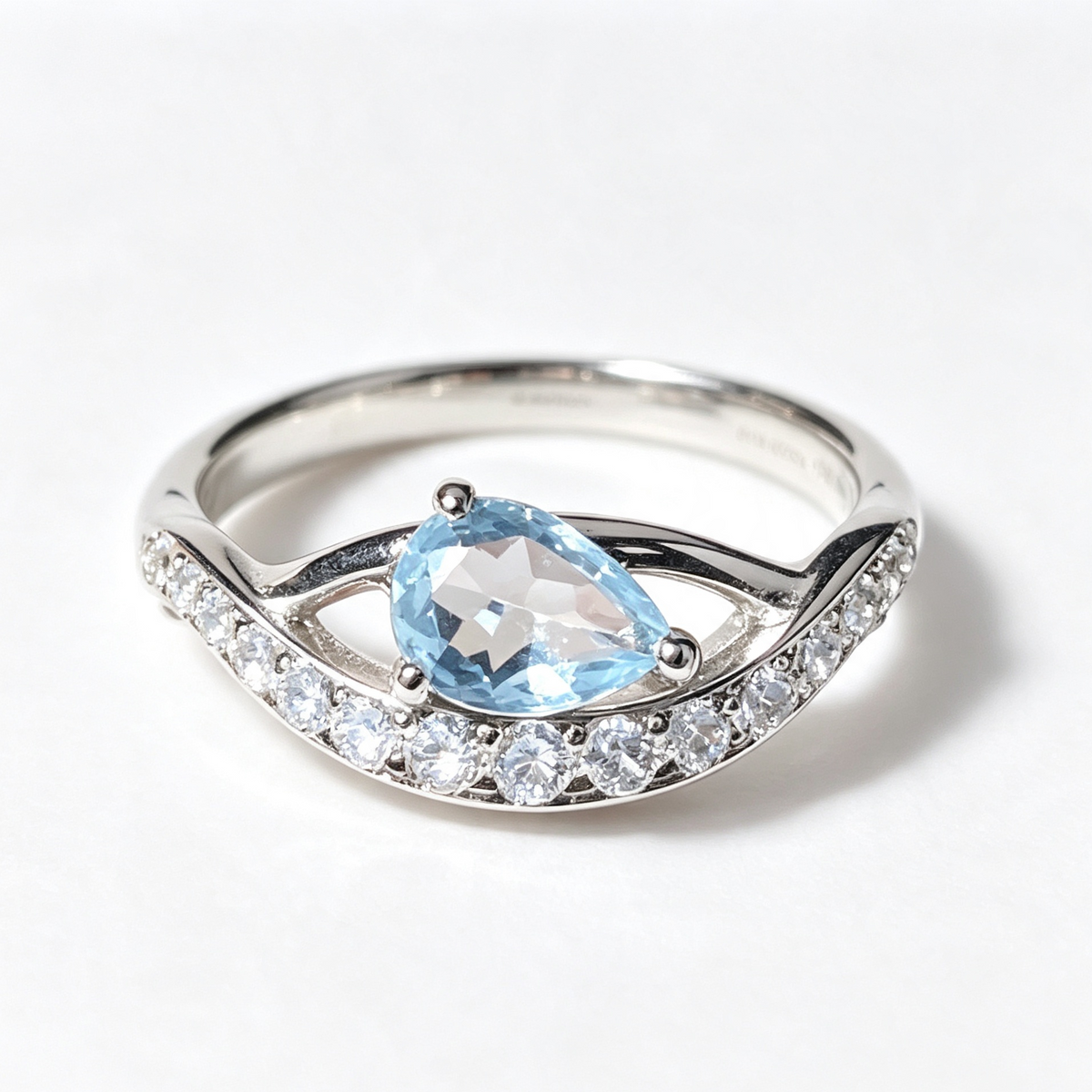 Natural Pear Blue Topaz Twisted Silver Ring, Inlaid With Side Diamonds