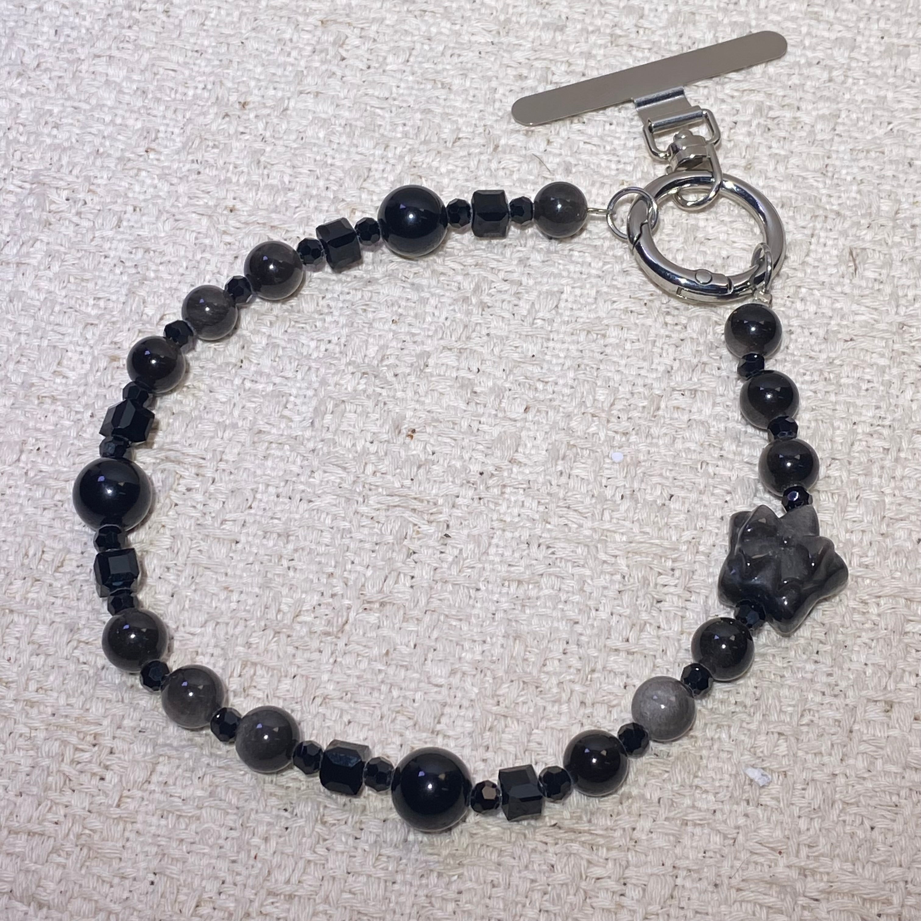 Silver Sheen Obsidian Bow & Rabbit Dual Use Beaded Bracelet / Bag Charm Glossy black silver flash obsidian bow rabbit carving mini bead wrist chain with toggle clasp